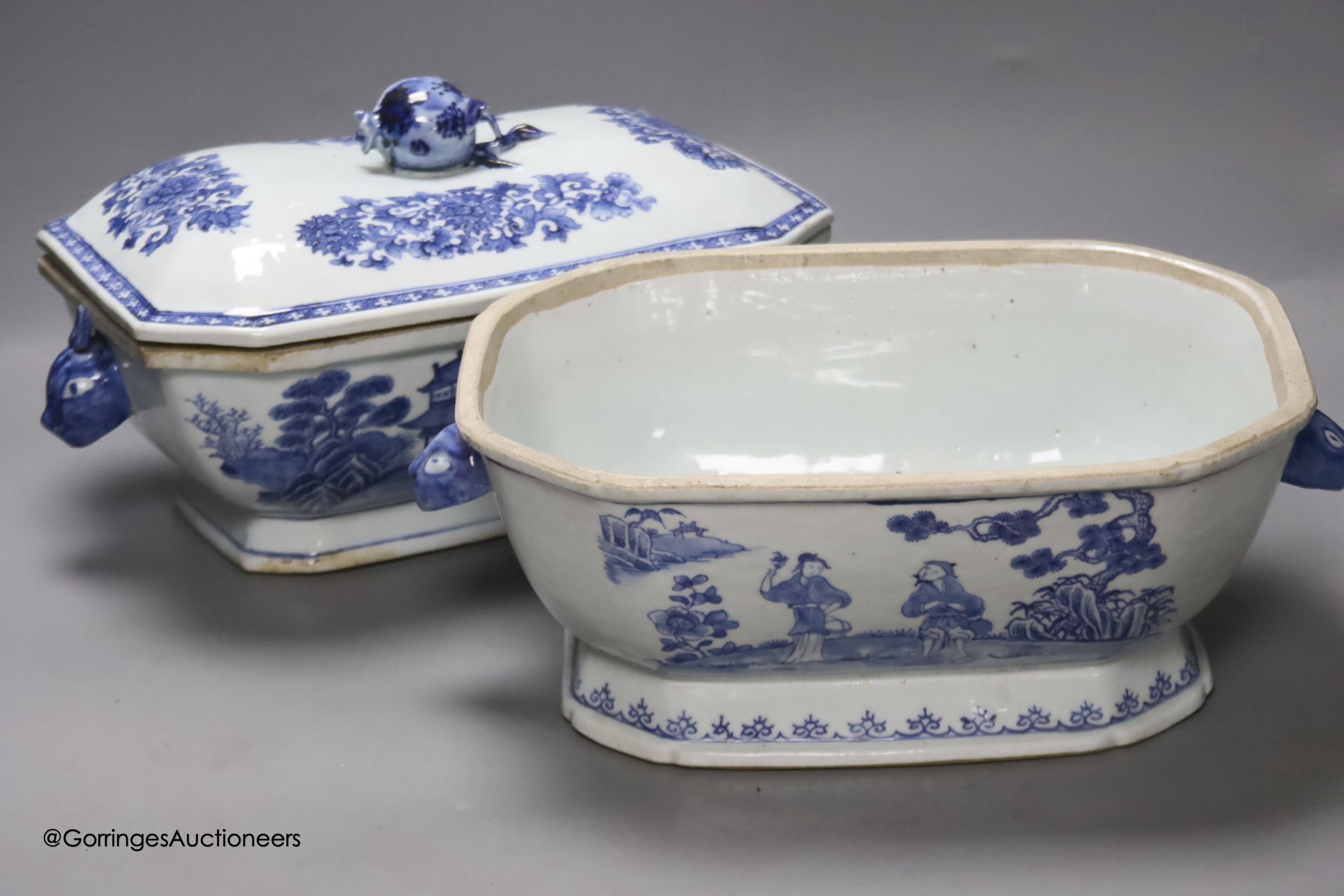 Two 18th century Chinese export blue and white lidded tureens, one lacking cover, 34cm